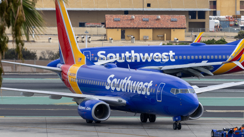 Two Southwest Airlines Boeing 737-700 taxiing at San Diego International Airport.