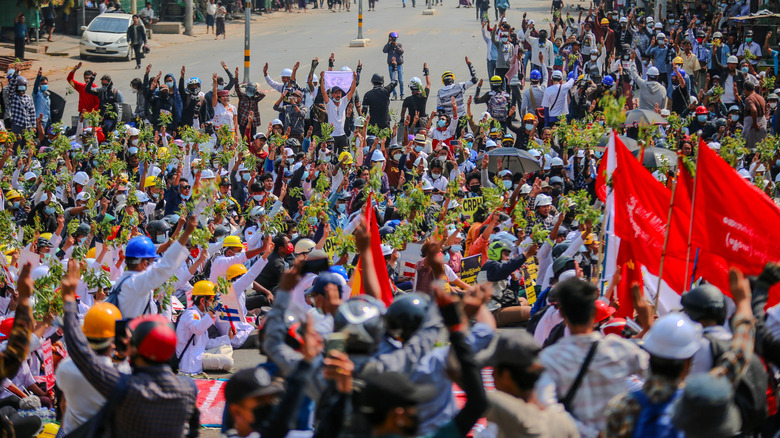 A large crowd protests in Myanmar.