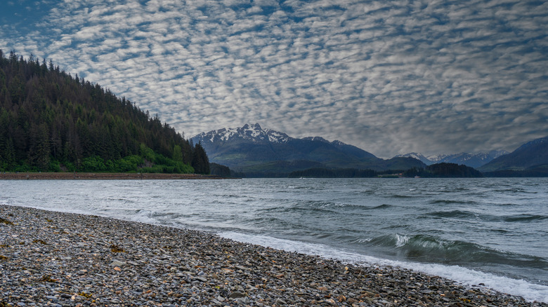 Chichagof Island's rocky beaches under a cloud-filled sky.