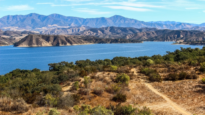 Cachuma Lake Recreation Area landscape with scrub and mountains surrounding the water