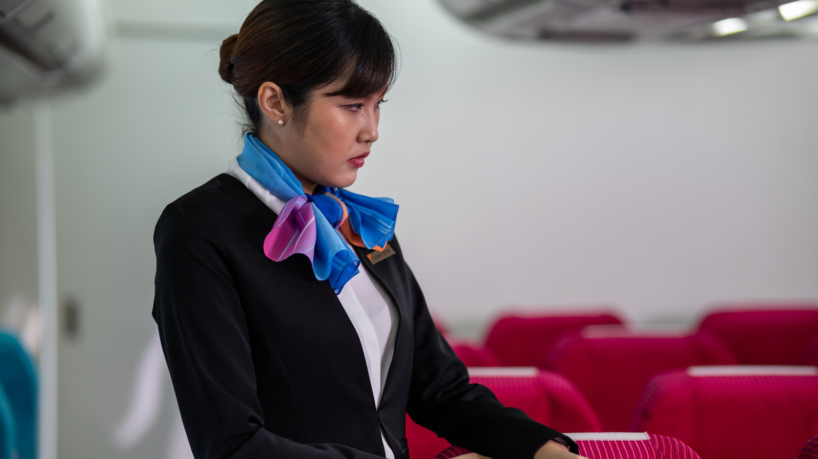 Flight Attendants Can't Stand This Annoying Way Passengers Get Their Attention

