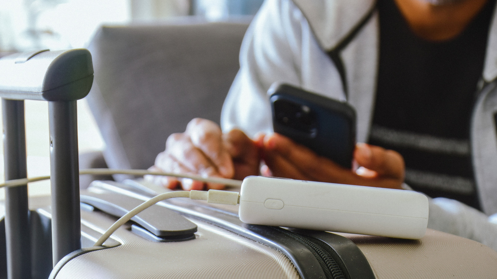 The Important Safety Rule Travelers Should Know When Using Portable Chargers On Flights

