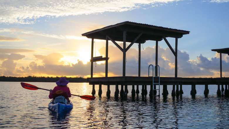 Kayaker approaches a camping platform in the Florida Everglades