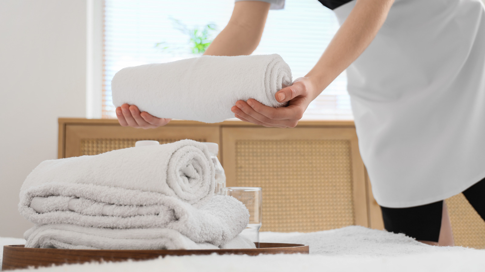 The Unsettling Reason You Should Request New Towels For Your Hotel Stay

