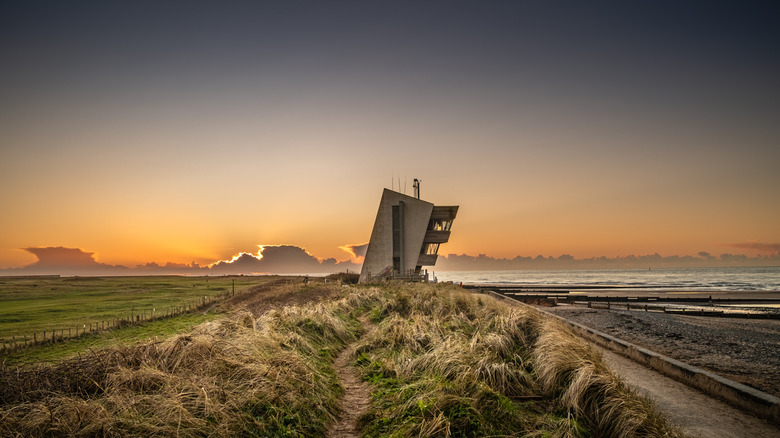 Rossall Point watchtower overlooking the beach in Fleetwood at sunset.