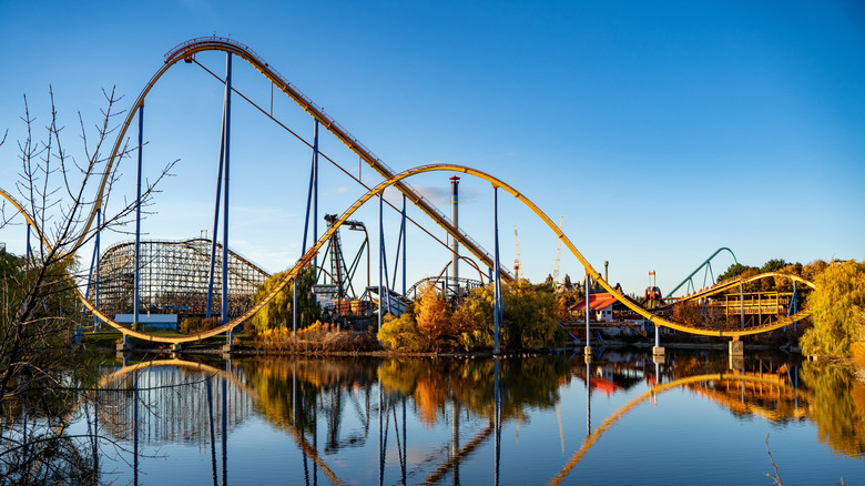 Yellow roller coaster reflects on a pond in Canada's Wonderland