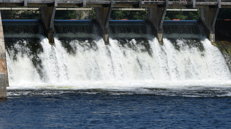 Water rushing out of the Hamlin Lake Dam