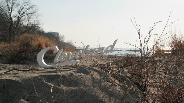 Cleveland sign on sand dunes overlooking Lake Erie at Euclid Beach Park, Ohio