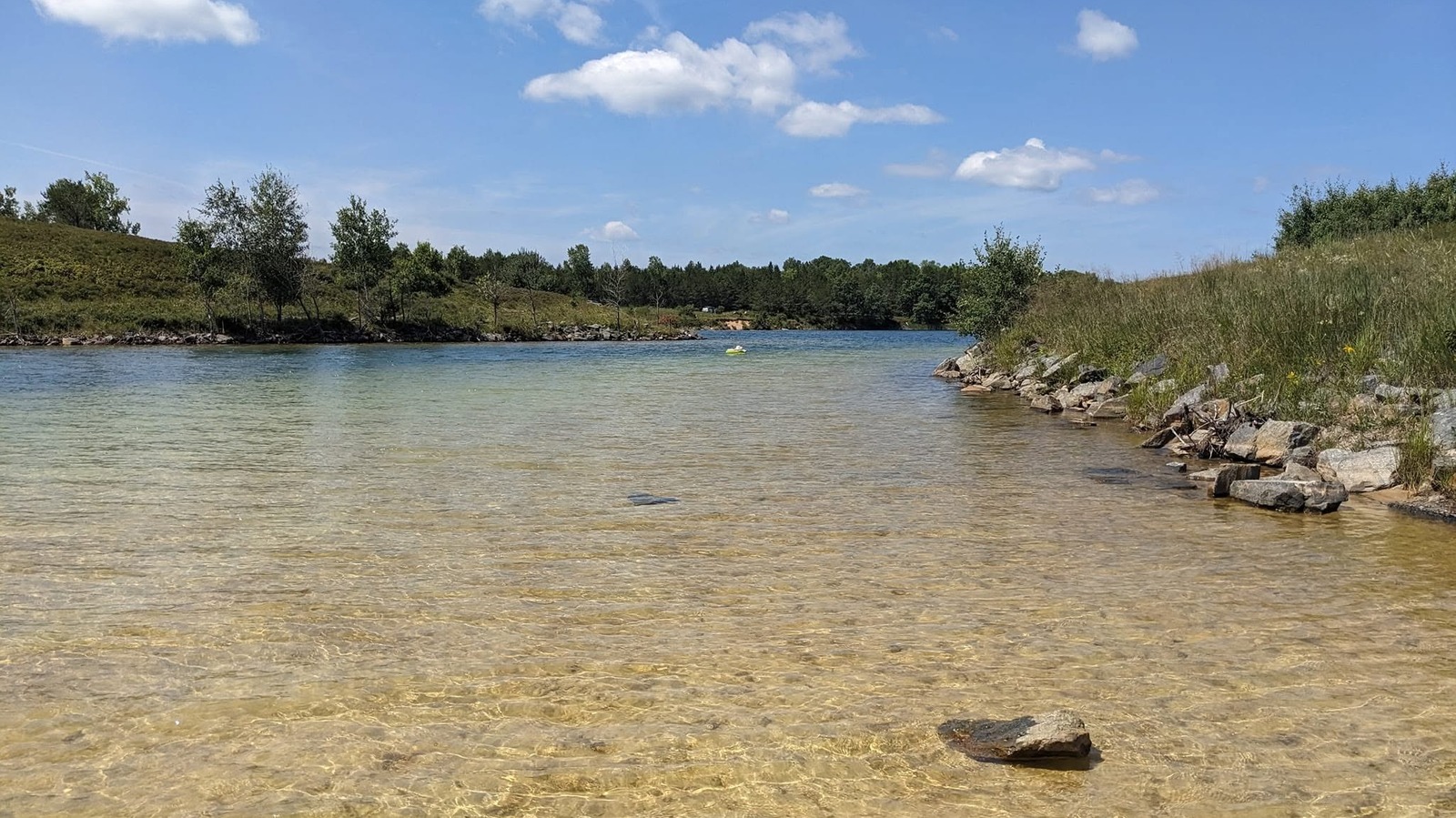 Wisconsin's Deepest Inland Lake Boasts A Sandy Beach And Crystal-Clear Water For Swimming

