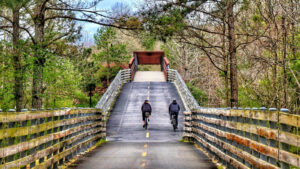 The South's Epic Two-State Rail Trail Runs Roughly 100 Miles Through Mountains And Forests

