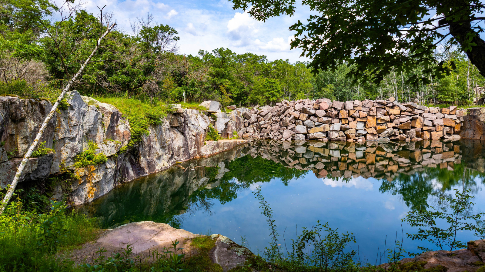 Minnesota's Former Granite Quarries Are Now A Swimming And Climbing Park

